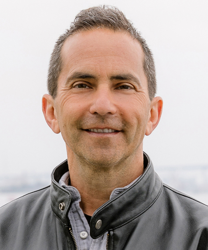 Headshot photo of Joshua Graff Zivin