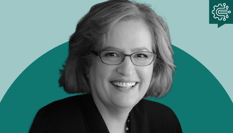 Black and white headshot photo of Pat Falcone on a two-tone teal background